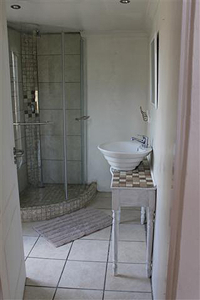 Guesthouse accommodation with ensuite bathroom.